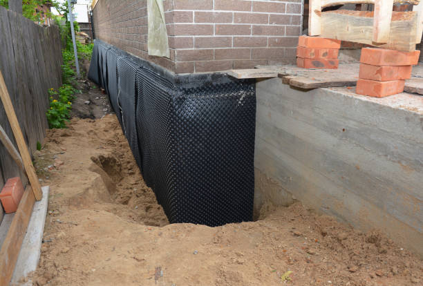 Happy homeowners after waterproofing job in Amissville